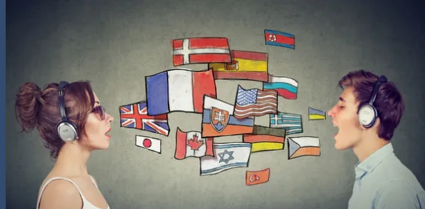 Two people with international flags between them representing multilingual interpreting